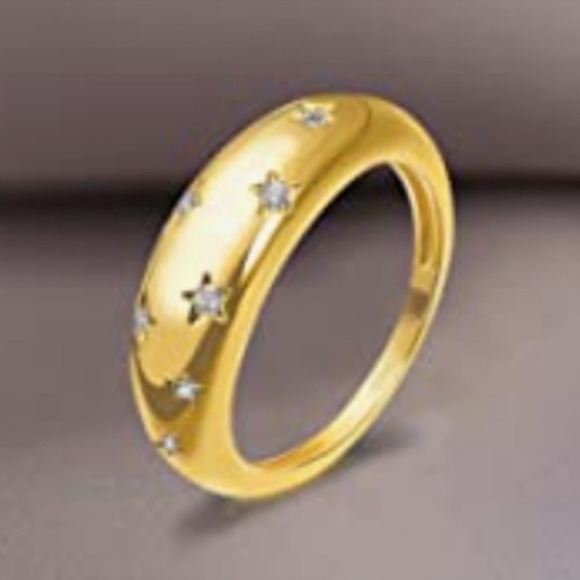 Gorgeous brand new gold over cubic zirconia starburst ring.